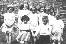 216: l-r back, Marie Counsel, unidentified, unidentified (w/ bow), Mame Norman, Rosemary Whelan,  Betty Whelan; front, Anne Counsel, Stan Whelan. (circa 1945) [courtesy of Mary Anne (Barry)  Counsel]  - Marie and Anne daughters of Michael Counsel &amp;amp; Mary Anne Barry; Mame daughter of ??;  Rosemary, Betty and Stan children of William Whelan &amp;amp; Mary Bridget Carroll